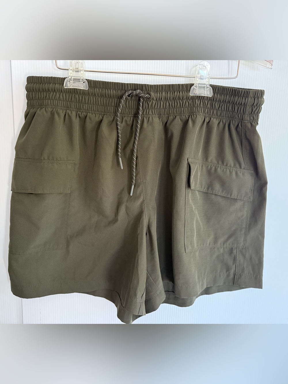 NEVER NOT HUSTLING khaki green tech shorts